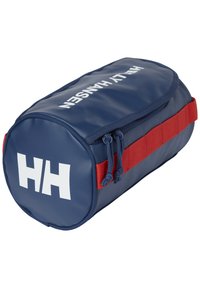 Marinblå cylindrisk väska med vitt logotyp, röd rem och dragsko-stängning. Tillverkad av hållbart, glänsande material med en slät yta.