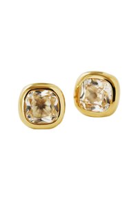 Pendientes de studs en tono dorado con piedras cuadradas y transparentes facetadas, engastadas en un bisel liso y redondeado. Superficie reflectante con una sutil textura.