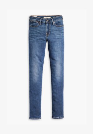 Slim-fit blå denim jeans med fem lommer, knaplukning og subtilt slidte detaljer på lårene og knæene.