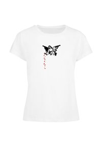 Hvid bomulds T-shirt med et sort engelgrafik med udstrakte vinger, der frigiver røde hjerter fra sin hånd. Klassisk crew neck-design.