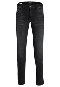 Jeans de mezclilla negra con un corte ajustado, que presentan un diseño clásico de cinco bolsillos, herrajes metálicos y un ligero desgaste en la parte delantera.