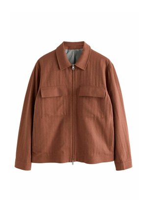 Brown zip-up jacket with two chest flap pockets and side pockets, long sleeves, and a pointed collar.