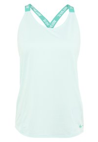 Top sportivo della luce verde menta con una texture liscia. Presenta bretelle incrociate con il marchio "just do it" e un piccolo logo sull'orlo.