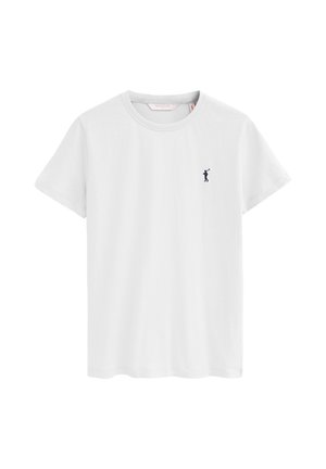 Biały t-shirt z krótkim rękawem i okrągłym dekoltem, z małym ciemnoniebieskim logo golfisty na lewej stronie klatki piersiowej.