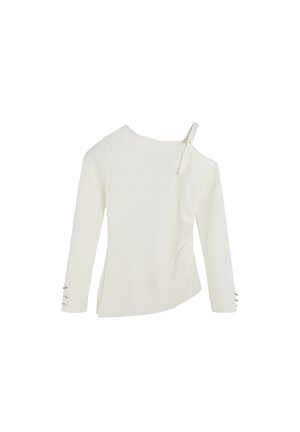 Top alb asimetric cu dungi, mâneci lungi și detaliu cu nod lateral; are trei butoni de decor pe mâneca stângă.