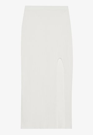 Gonna midi bianca a costine con uno spacco alto sul lato anteriore. Tessuto liscio, design aderente e una leggera elasticità per il comfort.