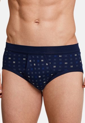 Marineblaue Herren-Slip aus weichem Stoff, mit einem geometrischen Muster in Hellblau und Grau, ausgestattet mit einem bequemen elastischen Bund.
