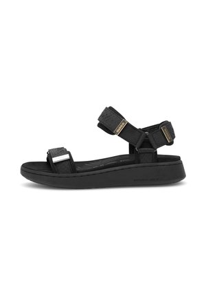 Black sandals featuring textured straps, adjustable hook-and-loop fasteners, a cushioned footbed, and a thick rubber sole.