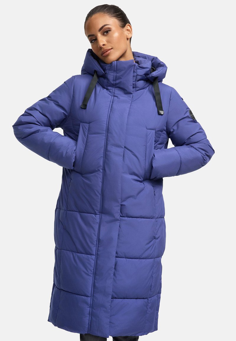 Long puffer coat in vibrant purple, featuring a hood, front pockets, and black straps. Textured quilted design for insulation.
