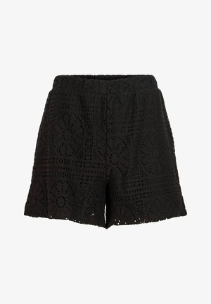 Fekete horgolt csipkenadrág virág- és geometrikus mintákkal, rugalmas derékrésszel és enyhén bővülő szárvéggel.