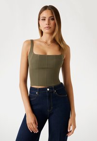 Unselected, olivgrün