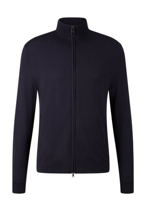 Marineblauwe lange mouwen volle ritssluiting cardigan met hoge kraag en geribde manchetten, weergegeven op een witte achtergrond.