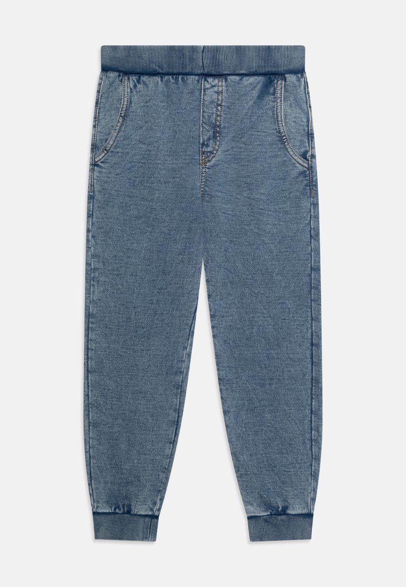 Denim-Jogginghosen mit elastischem Bund, Seitentaschen, schmal zulaufenden Bündchen und einer mittleren blauen Waschung. Dezentes Steppdetail überall.