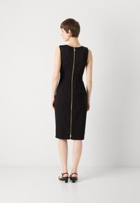 MARCIANO BY GUESS ZIP MIDI DRESS - Trikoomekko - black