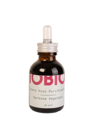 Bottiglia contagocce in vetro marrone scuro con tappo argentato, etichettata "Siero Viso Purificante Carbone Vegetale", contenente 60 ml di prodotto.