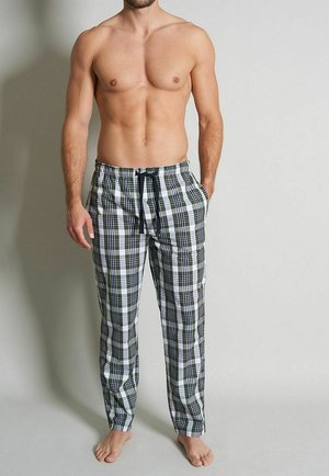 Pantalons de pyjama à carreaux verts et blancs avec une taille élastique, cordon de serrage et coupe décontractée, fabriqués dans un tissu en coton doux.