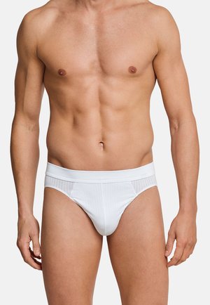Weiße Unterhosen mit einem strukturierten Bund und vertikalen Streifen auf der Vorderseite, hergestellt aus einem glatten Stoff, der für Komfort und Passform sorgt.
