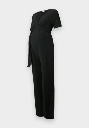 Black textured maternity jumpsuit with short sleeves, V-neckline, and a wrap belt at the waist.