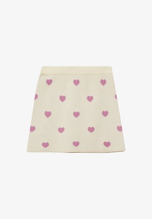 Kreemivärviline mini seelik sirge lõikega, kaunistatud ühtlaselt jaotatud väikeste roosa südame mustritega.