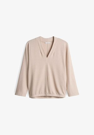 Beige geribbelde lange mouw top met een V-hals en een relaxte pasvorm. Zachte textuur, subtiel gathered zoom en naden op de schouders.