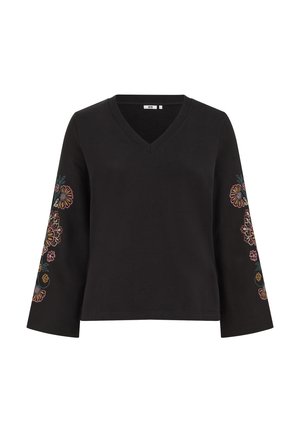Haut noir à col en V et manches longues avec une broderie florale colorée courant le long des deux manches.