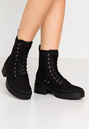 Bottines à plateau - black