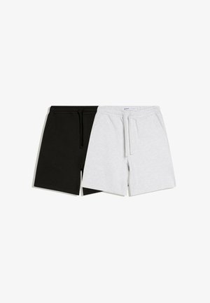 Twee paar casual short met trekkoorden, één zwart en één lichtgrijs, plat naast elkaar gelegd op een witte achtergrond.
