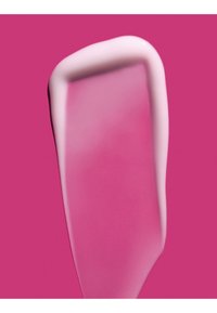Glossy pink makeup smear with a lighter pink creamy border on a solid magenta background.