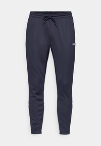 Navy blue athletic pants made of smooth fabric, featuring an elastic waistband with drawstring and a small white logo on one side.