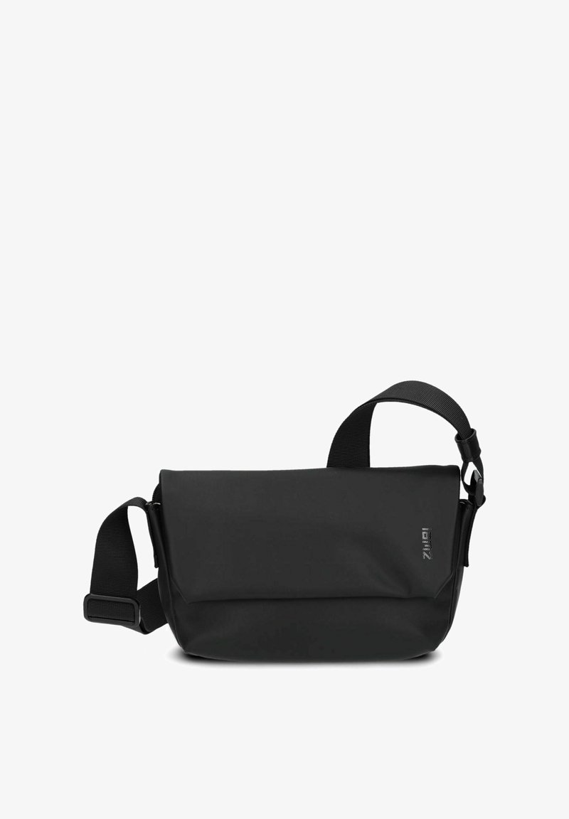 Black messenger bag made from smooth material, featuring a fold-over flap, adjustable strap, and a subtle logo on the side.
