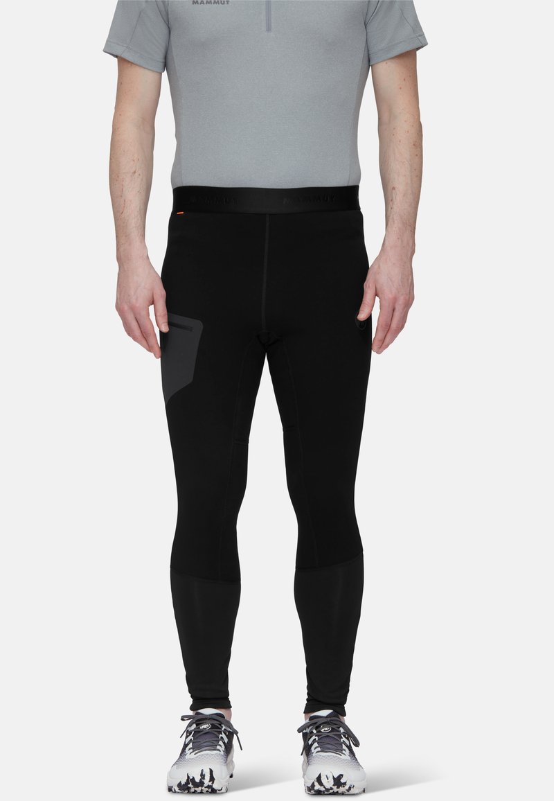 Svarta träningsleggings med hög midja och kontrasterande sömmar, med en sidoficka och en åtsittande design för att öka rörligheten.