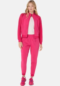 ASICS MATCH - Jogginghose - bright rose