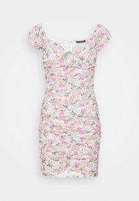 Robe mini froncée blanche avec imprimé floral rose et pêche, manches courtes bouffantes, détail noué à l'avant et encolure dégagée.