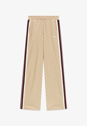 Μπεζ παντελόνι με φαρδιά μπατζάκια και διακριτικό μοτίβο με λογότυπο σε όλη την επιφάνεια, λαστιχένια μέση και πλαϊνές ρίγες σε λευκό και σκούρο κόκκινο.