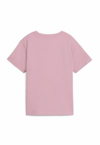 T-shirt in cotone rosa con maniche corte, scollatura rotonda e schiena liscia, caratterizzata da una texture morbida e una vestibilità rilassata.