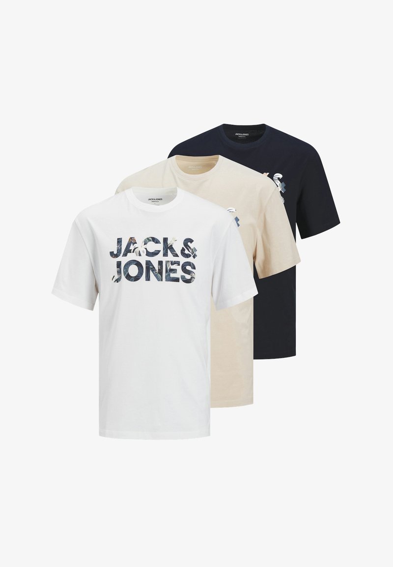 Three t-shirts in white, beige, and navy, featuring the text "JACK & JONES" in a patterned design, made from soft cotton fabric.