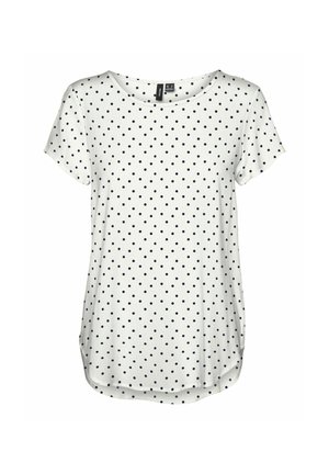 Witte T-shirt met korte mouwen, versierd met marineblauwe stippen, ronde halslijn, zacht stof en een gebogen zoom.