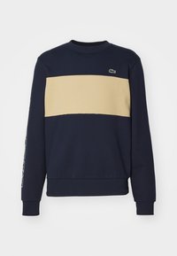 Unselected, bleu marine/beige