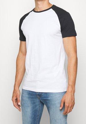 White T-shirt with black raglan sleeves, round neckline, and soft cotton material. Features a relaxed fit and smooth texture, ideal for casual wear.