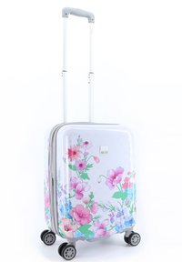 Hard-shell suitcase with a white background and colorful floral pattern. Features a telescopic handle and four wheels for mobility.