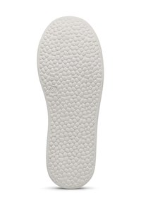 White insole with a textured, pebble pattern. Smooth edges with a rounded toe and heel, featuring a small embossed number on the side.