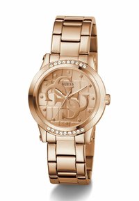 Roségoldene Uhr mit glänzendem Metallarmband und einem gemusterten Zifferblatt, das Logo-Designs zeigt. Mit Kristallen um den Gehäuserand akzentuiert.