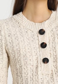 Free People Strickpullover - beige