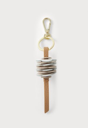 Porte-clés composé de morceaux de cuir empilés et circulaires dans des teintes variées, attaché à un clip en métal doré et un anneau arrondi pour une fixation sécurisée.