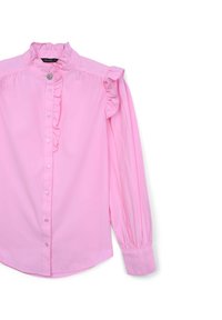 Rosa Langarmshirt mit Rüschendetails an den Schultern, hohem Kragen und Knopfleiste. Hergestellt aus glattem, leichtem Stoff.