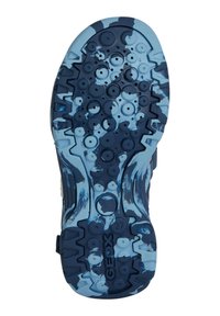 Sněrovací podrážka v námořnické modři s vyvýšenými kruhovými vzory, texturovanými oblastmi pro lepší grip a značením. Obsahuje různé odstíny modré v designu.