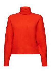 Rollkragenpullover in leuchtendem Orange, aus weichem Material gefertigt. Verfügt über gerippte Akzente an den Ärmeln und einen lockeren Schnitt.