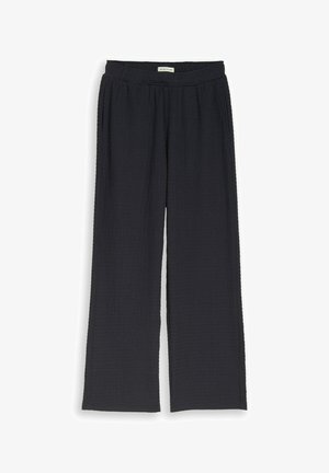 Black wide-leg pants with textured fabric, elastic waistband, and front pockets, labeled "Tom Tailor" on the inner waistband.