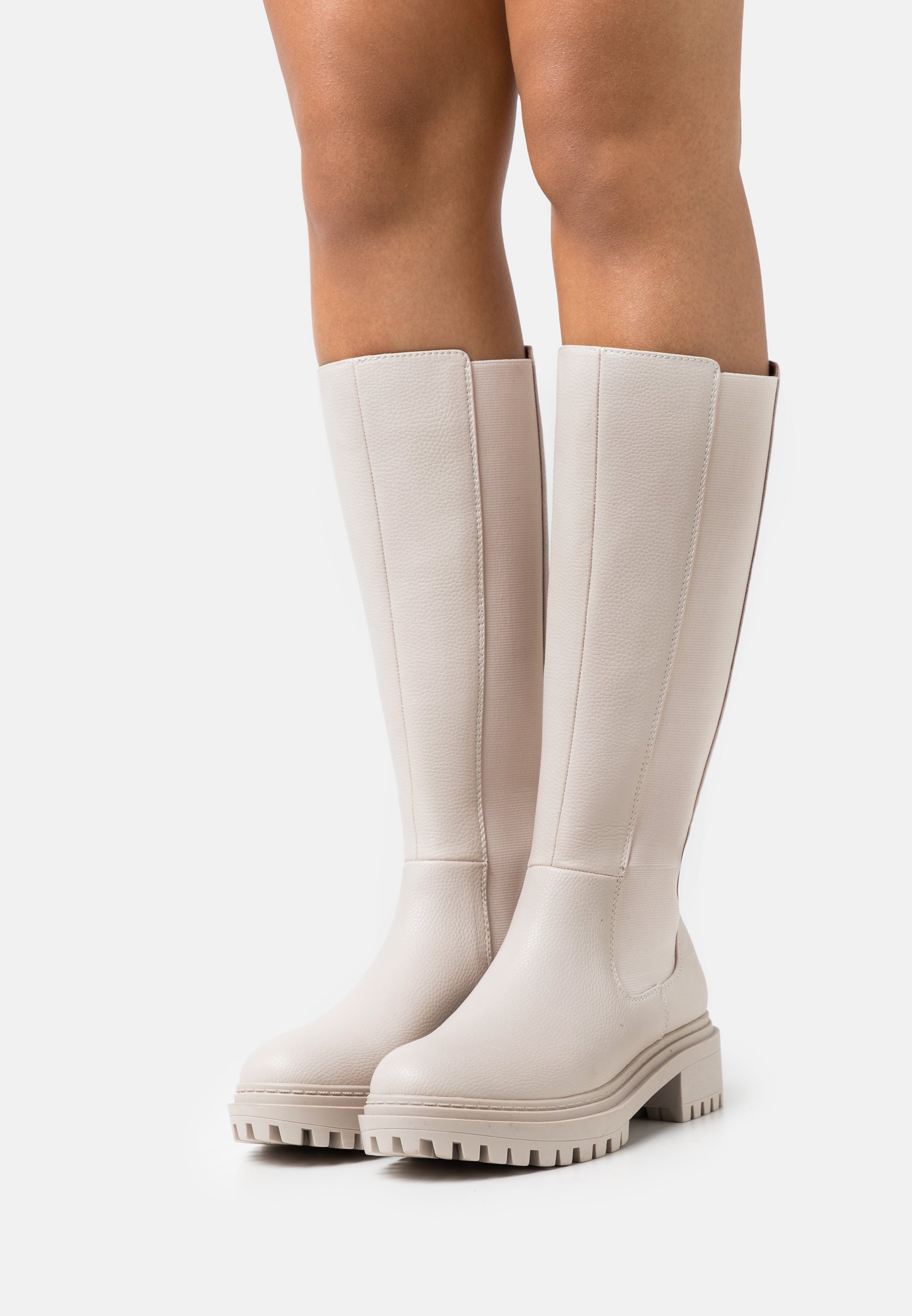white plateau boots