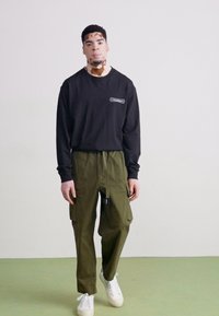 Manastash FLEX CLIMBER - Kargopüksid - oliv